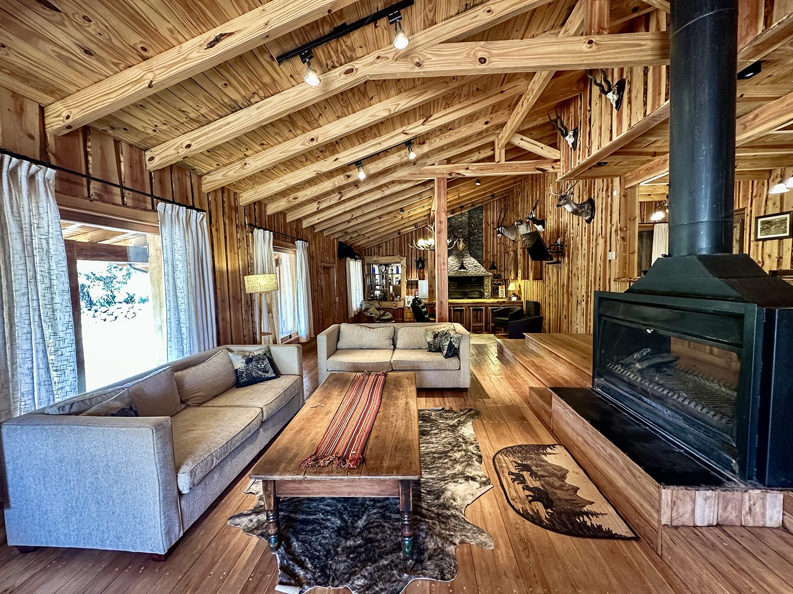 Lodge living room with fireplace and rustic decor