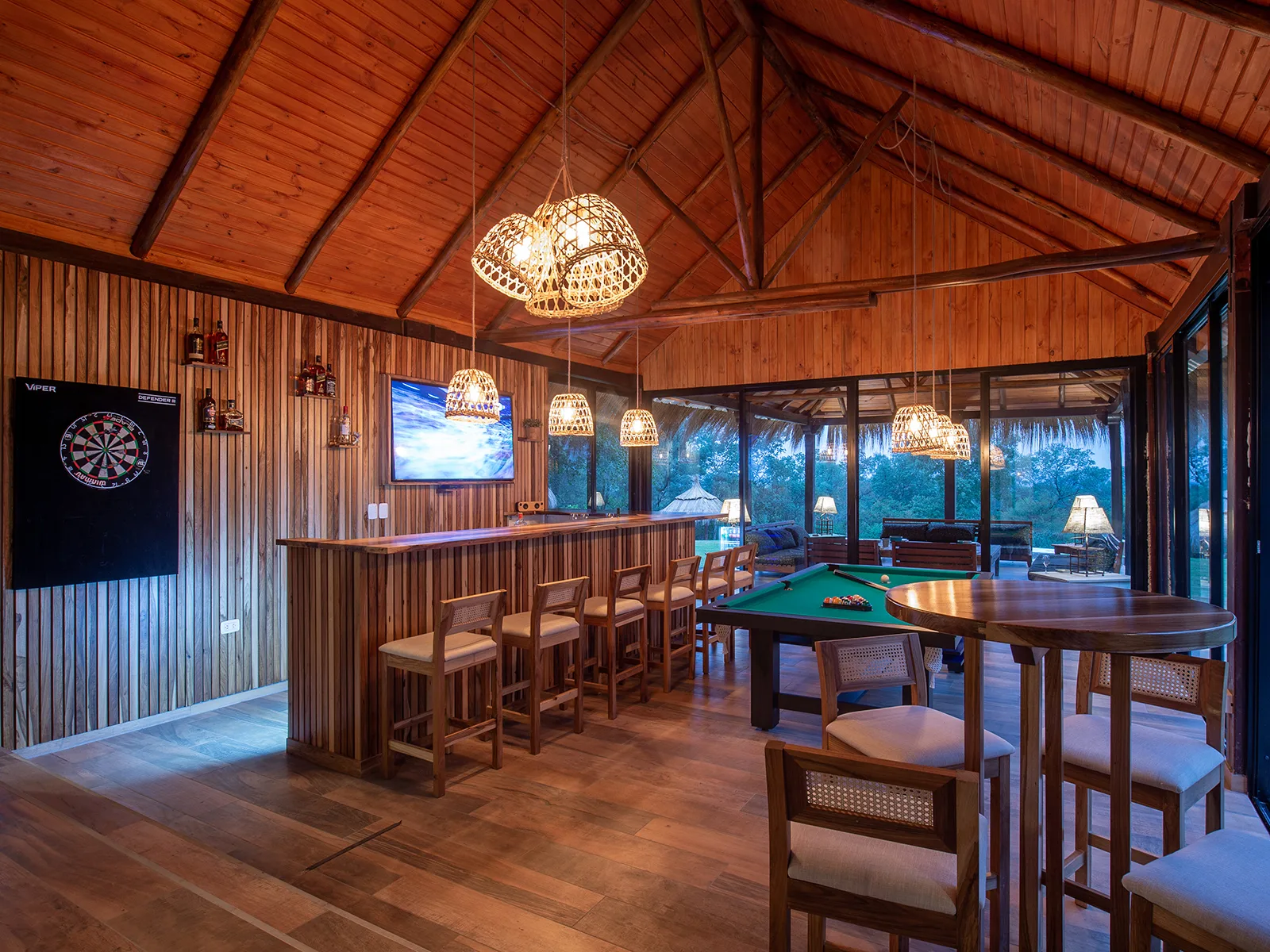 Lodge bar with billiard table, darts and warm wood interior