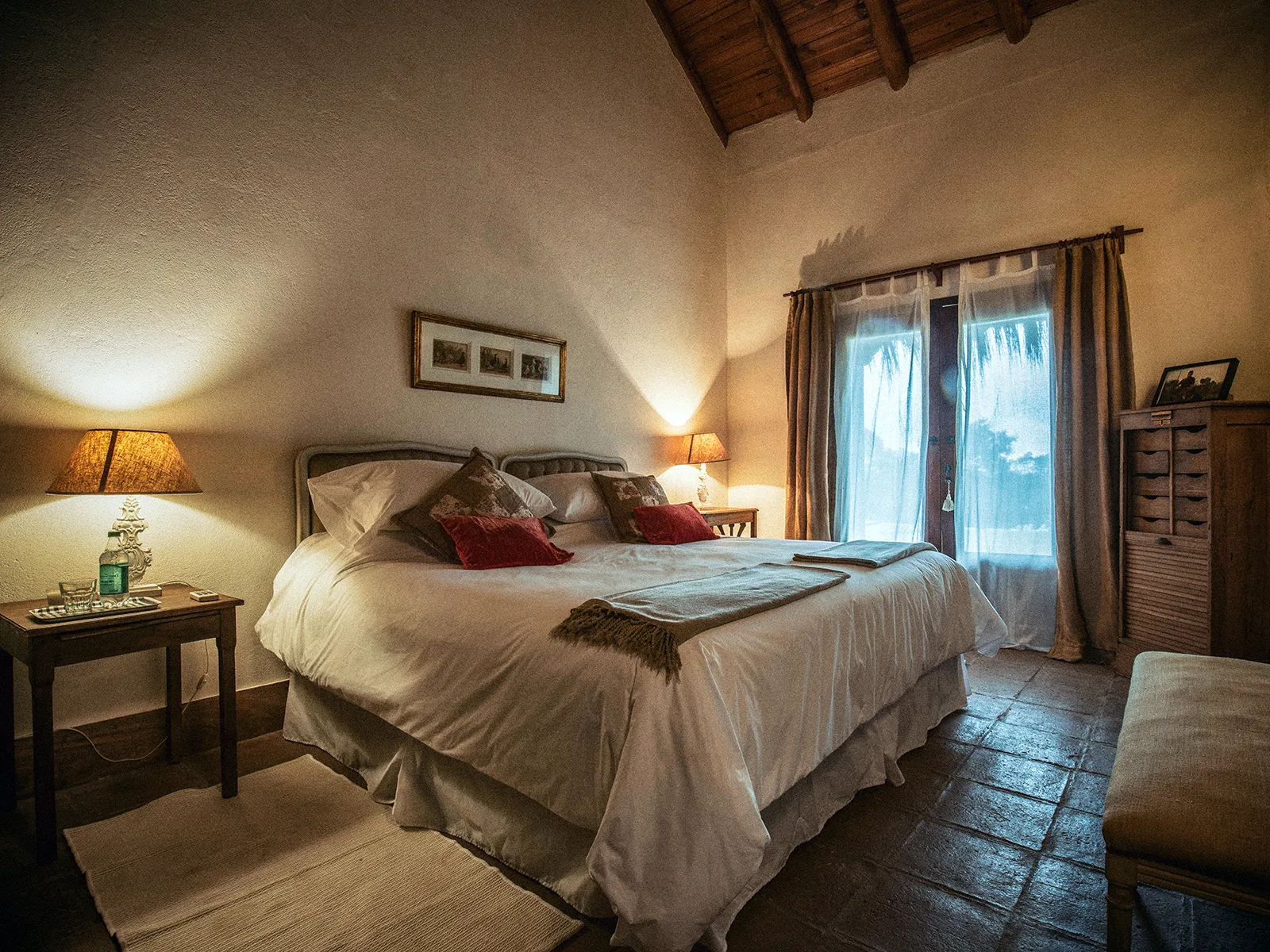 Cozy lodge bedroom with rustic decor and warm lighting